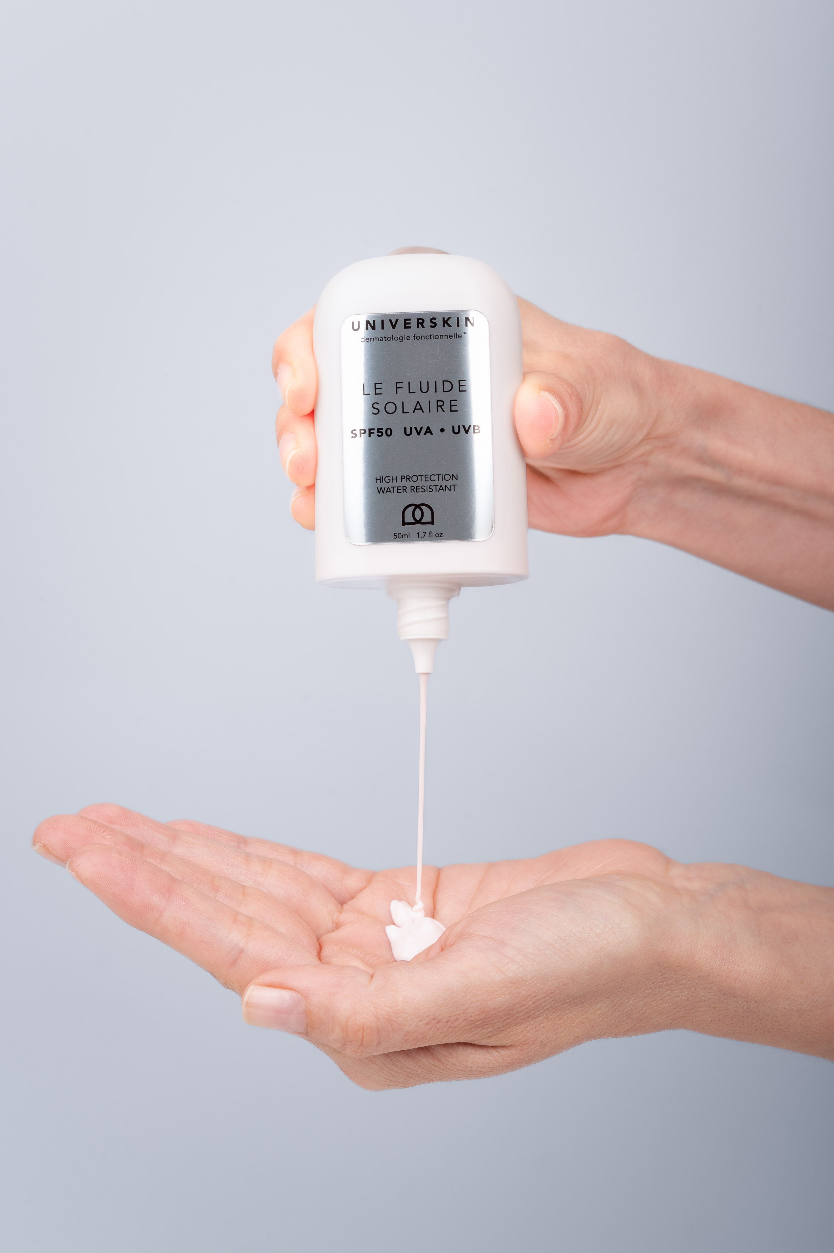 Universkin Sunscreen Fluid SPF50 applied to the face