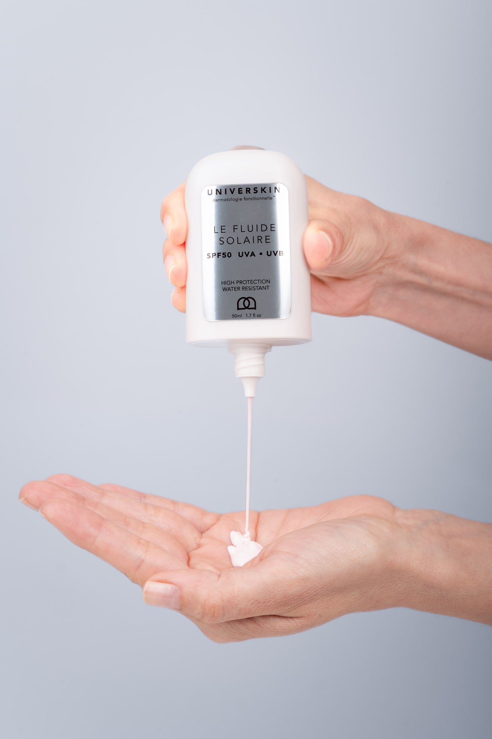 Universkin Sunscreen Fluid SPF50 applied to the face