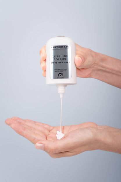 Universkin Sunscreen Fluid SPF50 applied to the face